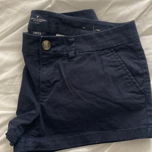 🦅 American Eagle women’s shortie shorts size 10 navy blue, with stretch.